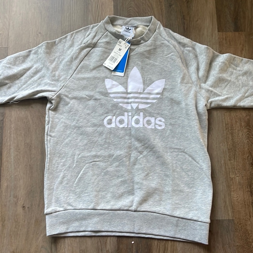 Men’s new Adidas sweater, size medium
